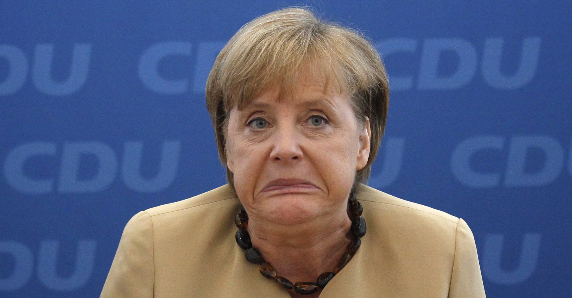 Меркель обвиняют в злоупотреблении служебным положением